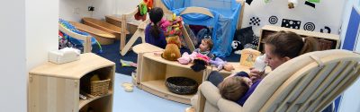 Children and staff playing at MK College nursey